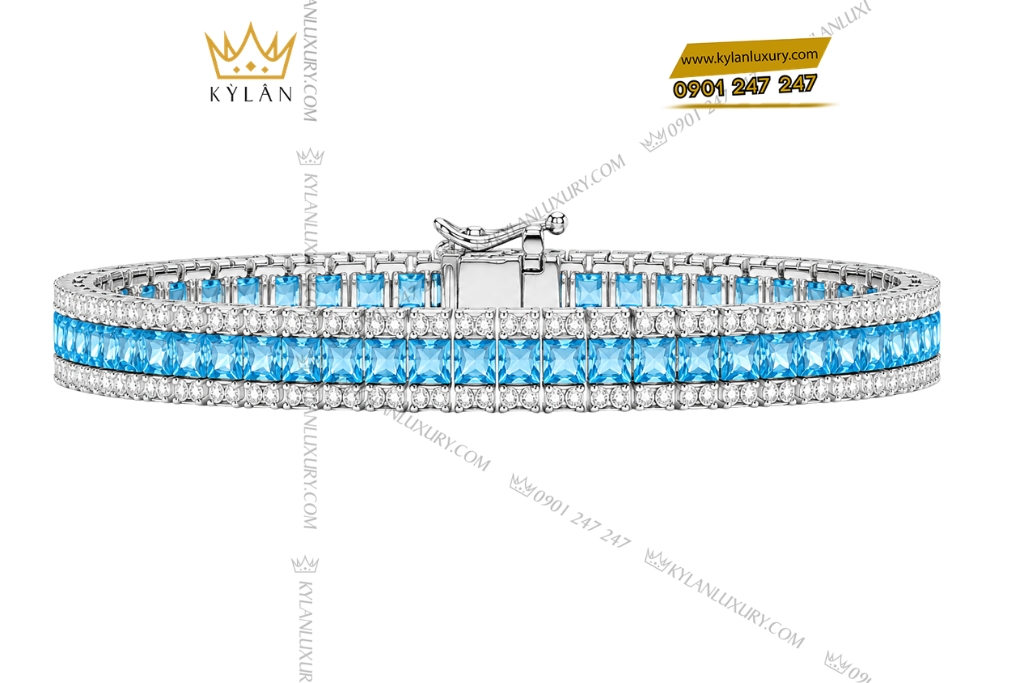 Lắc tay vàng trắng Au750 đính kim cương và đá Topaz