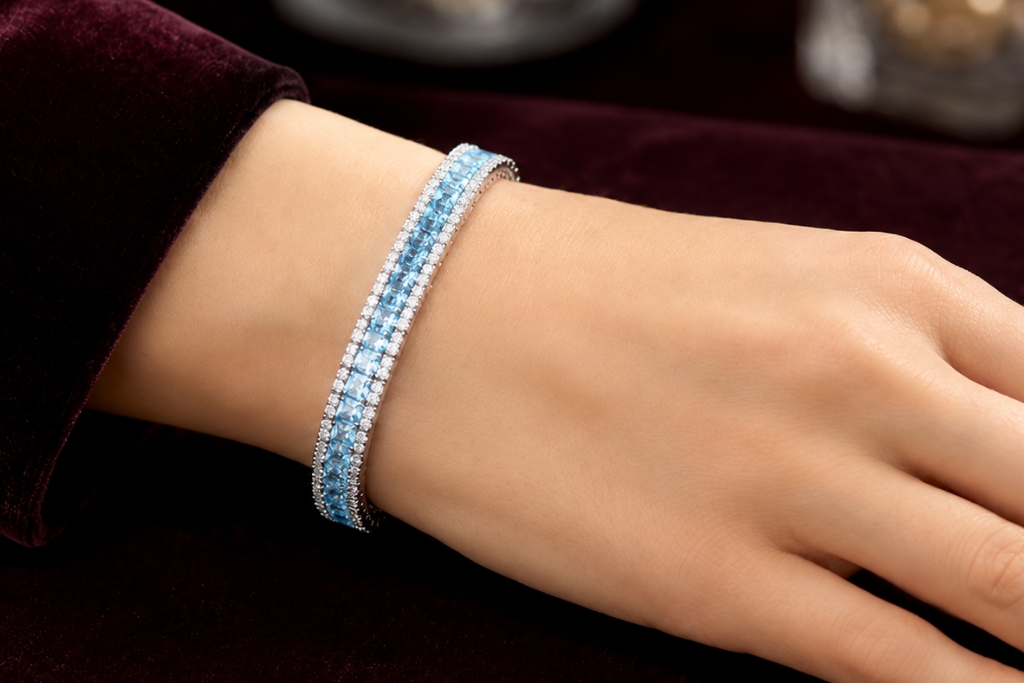 Lắc tay vàng trắng Au750 đính kim cương và đá Topaz