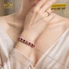 Lắc tay vàng trắng Au750 đính kim cương và sapphire đỏ