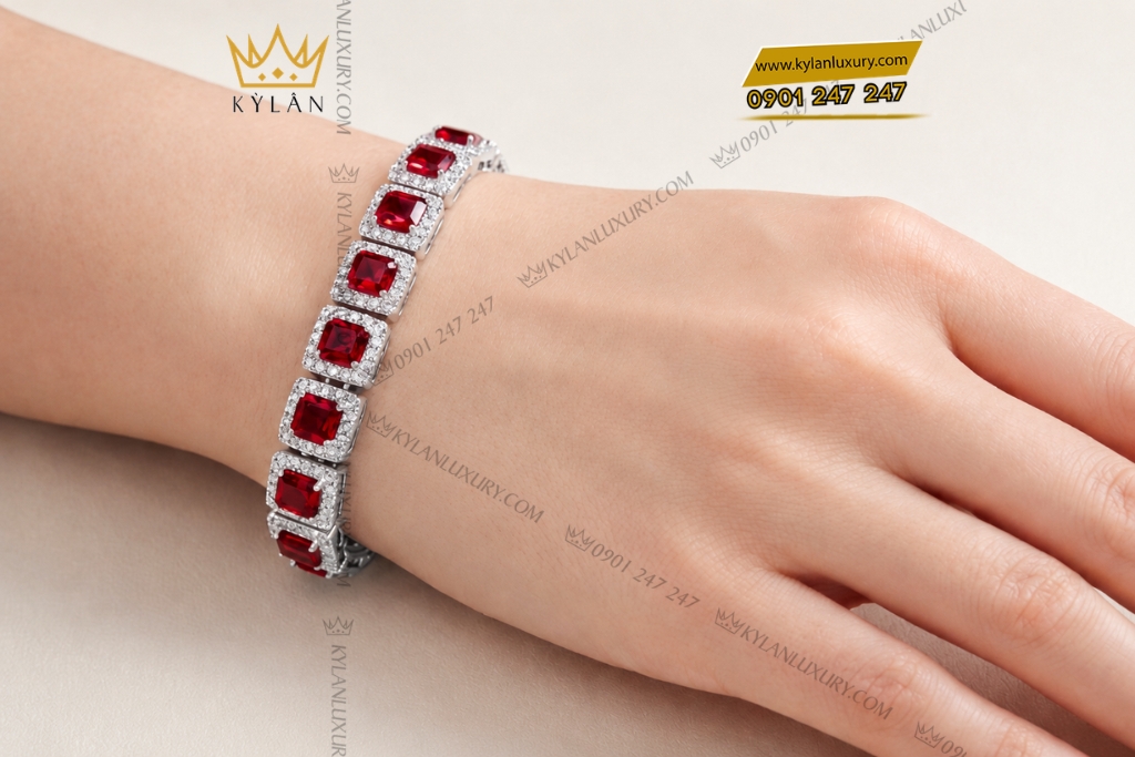 Lắc tay vàng trắng Au750 đính kim cương và sapphire đỏ