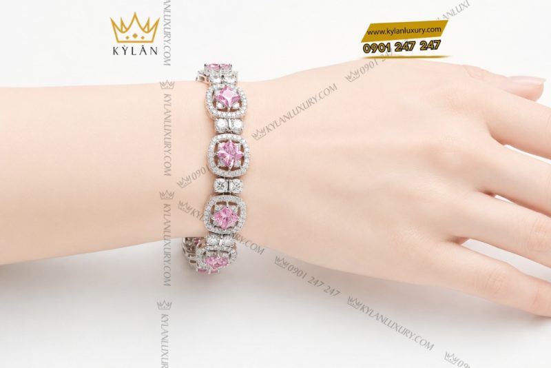 Lắc tay vàng trắng Au750 đính kim cương và sapphire hồng