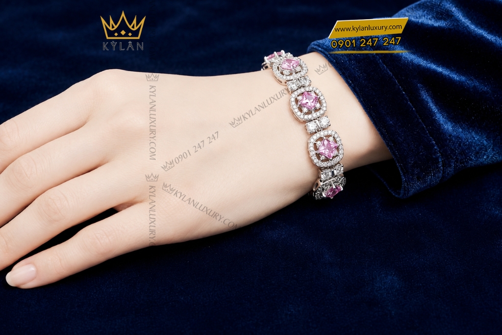 Lắc tay vàng trắng Au750 đính kim cương và sapphire hồng