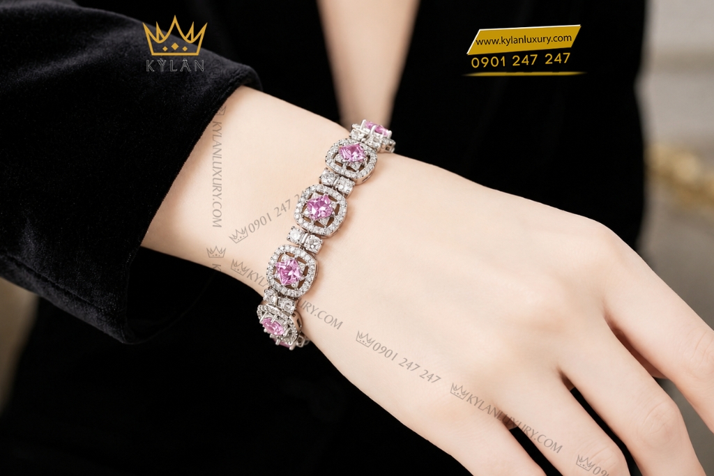 Lắc tay vàng trắng Au750 đính kim cương và sapphire hồng
