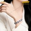 Lắc tay vàng trắng Au750 đính kim cương và sapphire xanh dương
