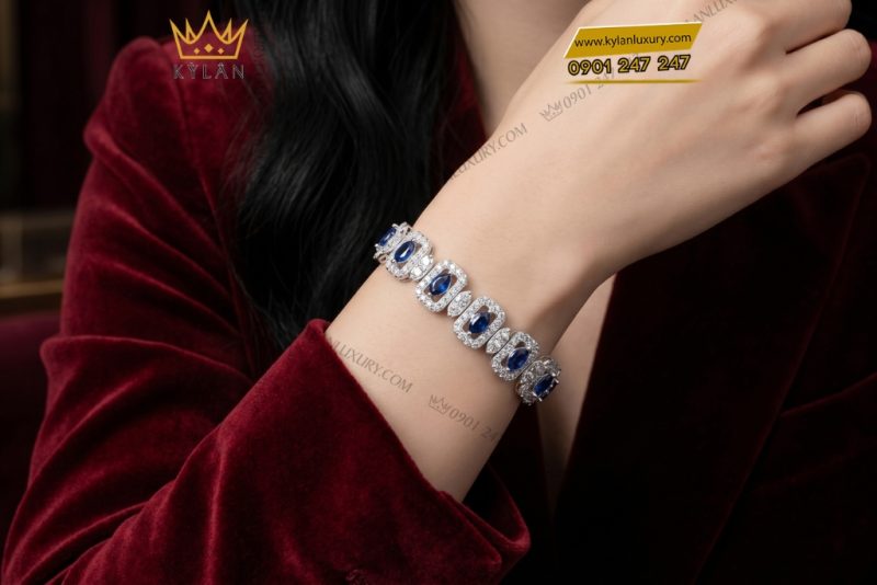 Lắc tay vàng trắng Au750 đính kim cương và sapphire xanh dương