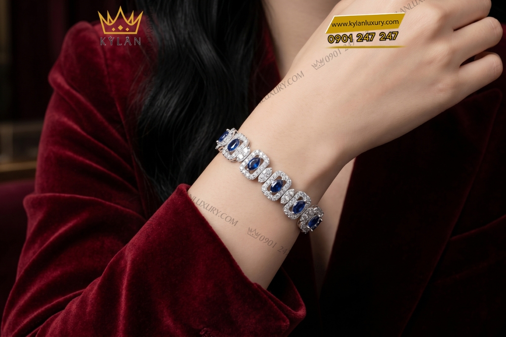 Lắc tay vàng trắng Au750 đính kim cương và sapphire xanh dương