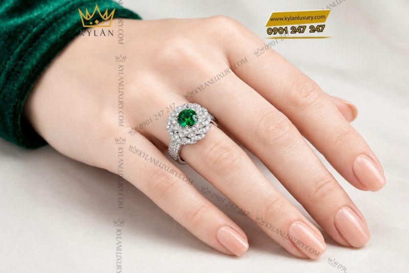 Nhẫn nữ vàng trắng Au750 đính kim cương và đá ngọc lục bảo