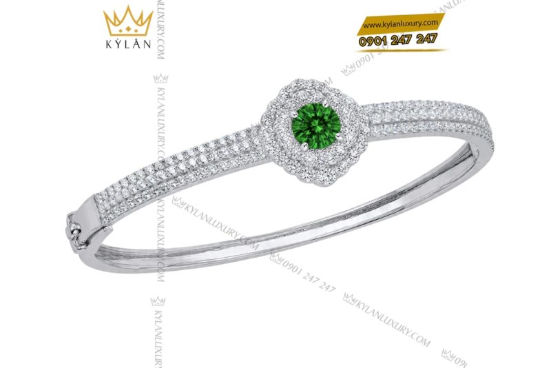 Vòng tay vàng trắng Au750 đính kim cương và ngọc lục bảo