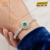Vòng tay vàng trắng Au750 đính kim cương và ngọc lục bảo