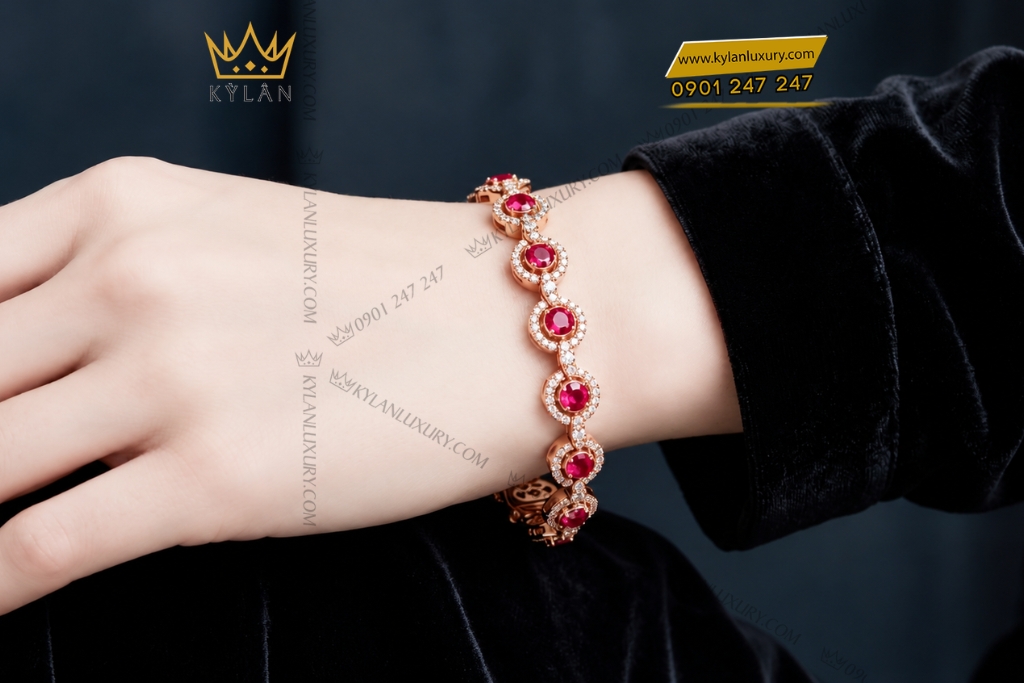 Lắc tay vàng hồng Au750 đính sapphire đỏ