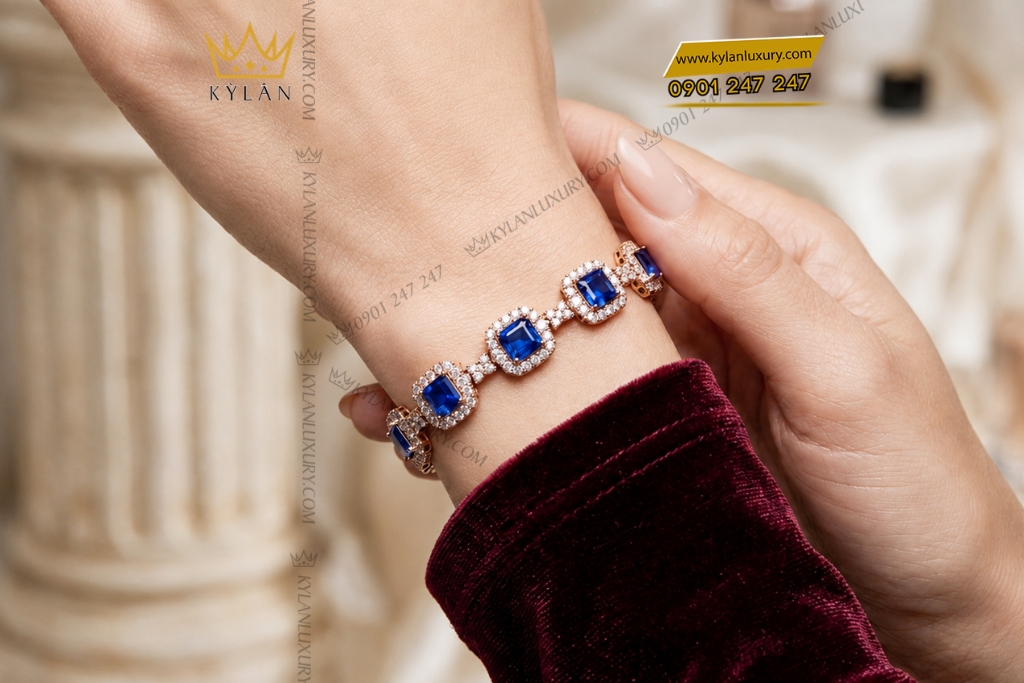 Lắc tay vàng hồng Au750 đính sapphire xanh