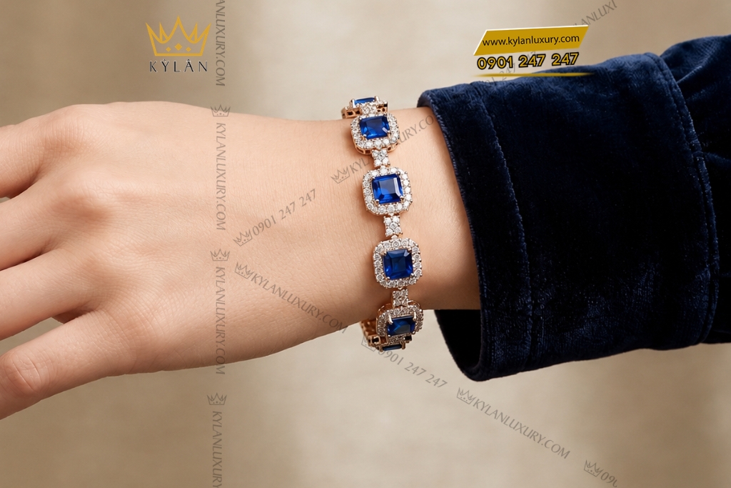 Lắc tay vàng hồng Au750 đính sapphire xanh