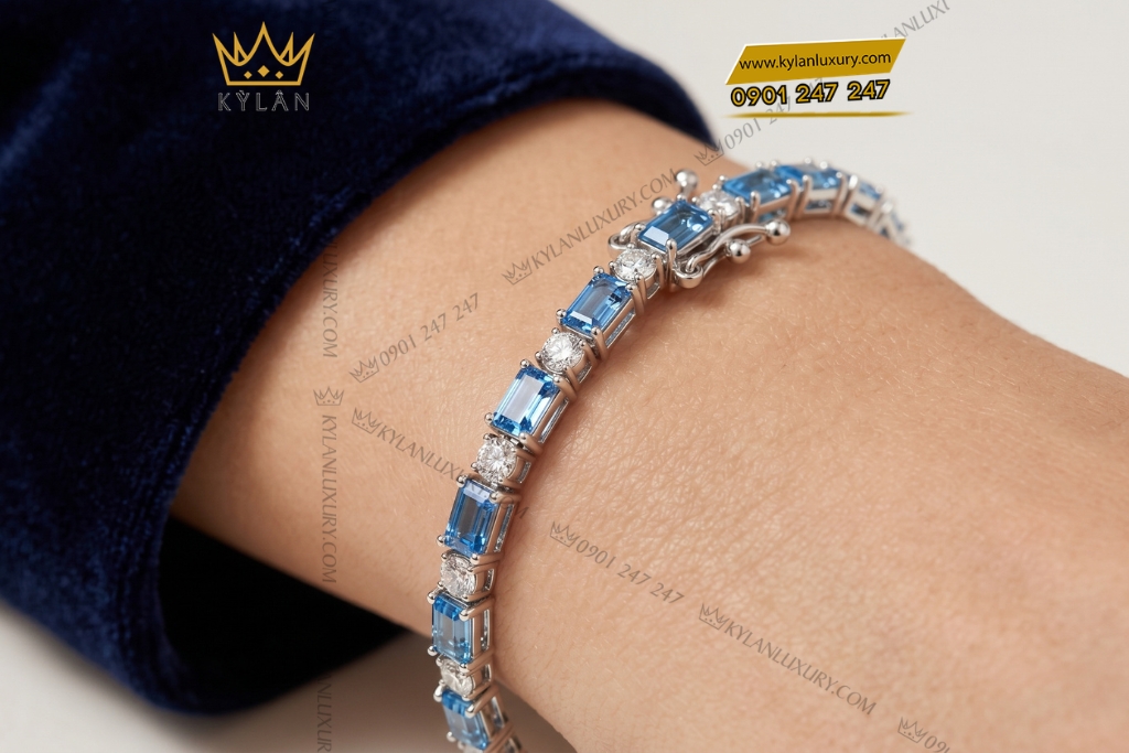 Lắc tay vàng trắng Au750 đính Topaz