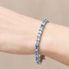 Lắc tay vàng trắng Au750 đính Topaz