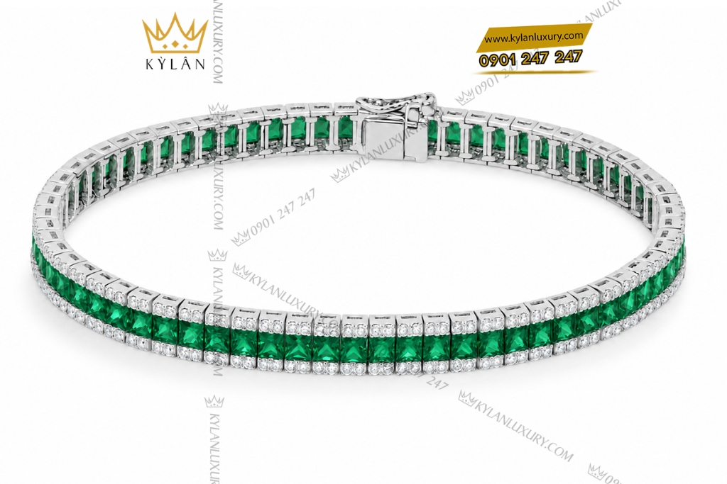 Lắc tay vàng trắng Au750 đính ngọc lục bảo