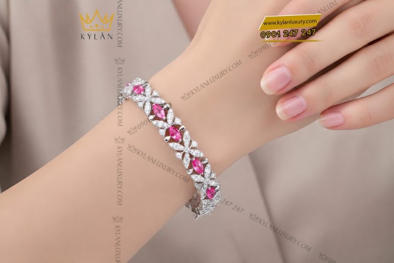 Lắc tay vàng trắng Au750 đính sapphire hồng