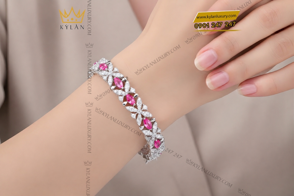 Lắc tay vàng trắng Au750 đính sapphire hồng