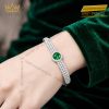 Vòng tay vàng trắng Au750 đính sapphire xanh lá