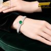 Vòng tay vàng trắng Au750 đính sapphire xanh lá