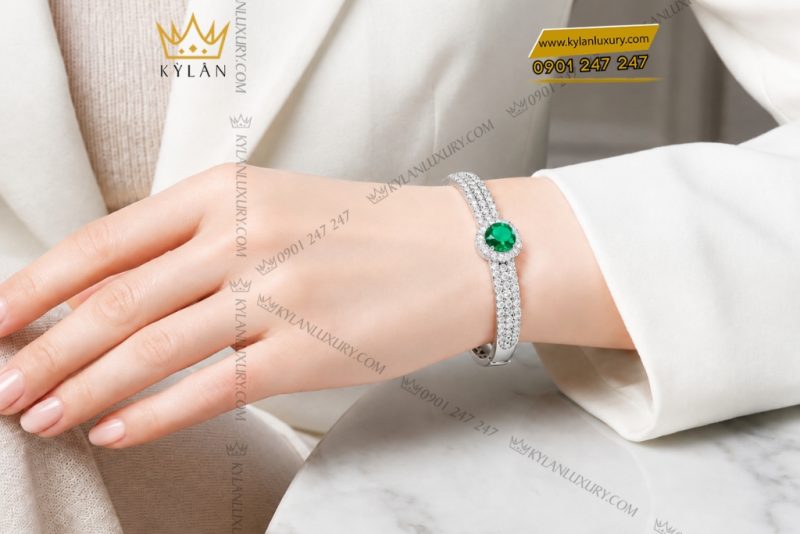 Vòng tay vàng trắng Au750 đính sapphire xanh lá