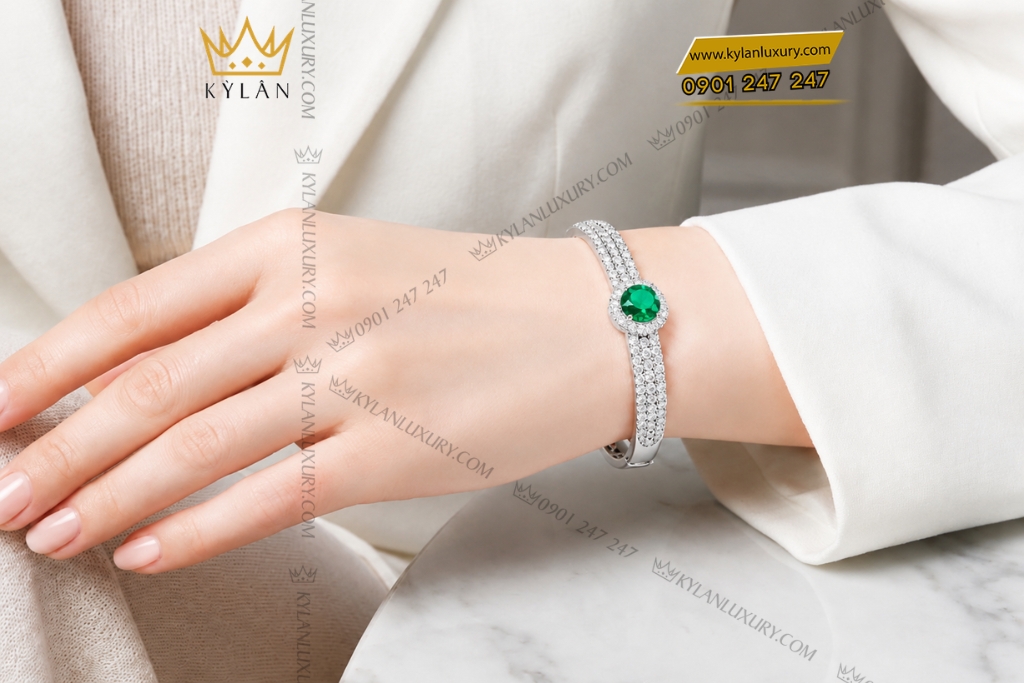 Vòng tay vàng trắng Au750 đính sapphire xanh lá 5 Vòng tay vàng trắng Au750 đính sapphire xanh lá