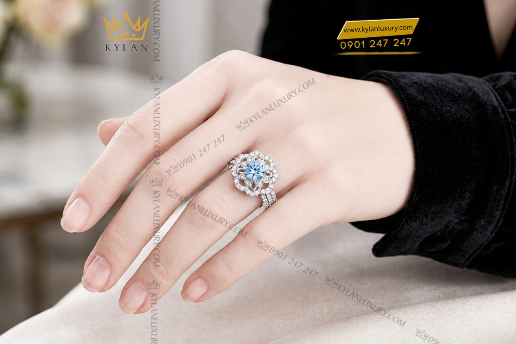 Nhẫn nữ vàng trắng Au750 đính đá Topaz