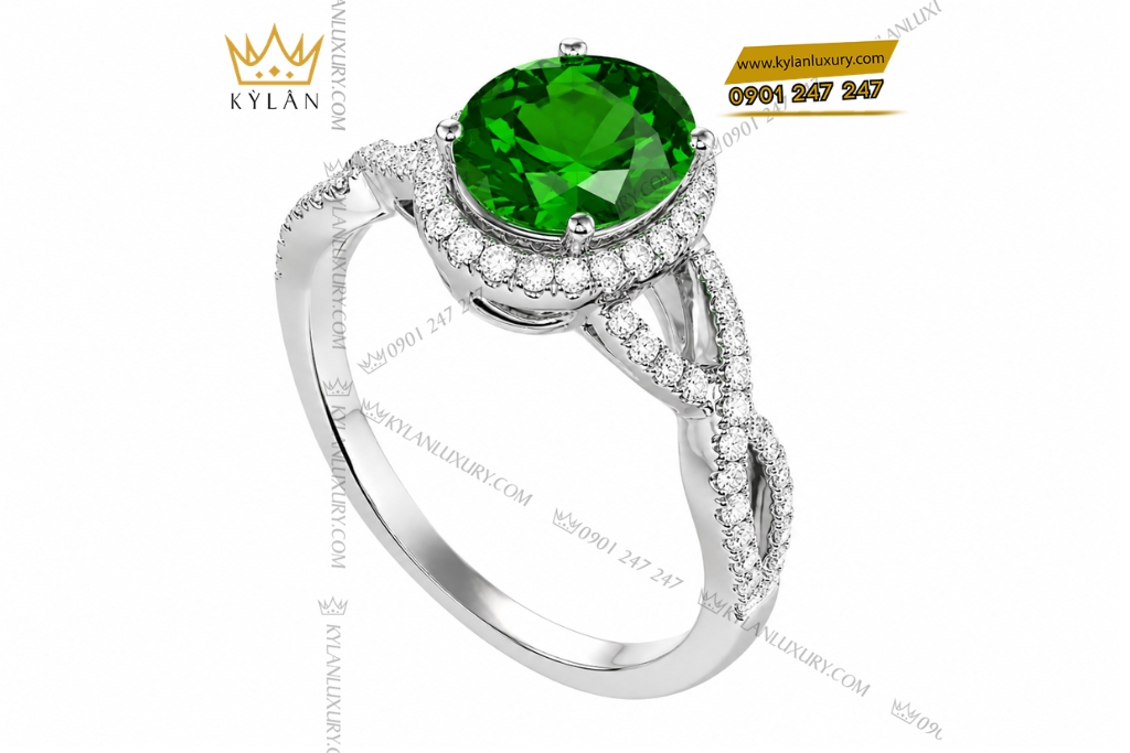 Nhẫn nữ vàng trắng Au750 đính sapphire xanh lá 2 Nhẫn nữ vàng trắng Au750 đính sapphire xanh lá