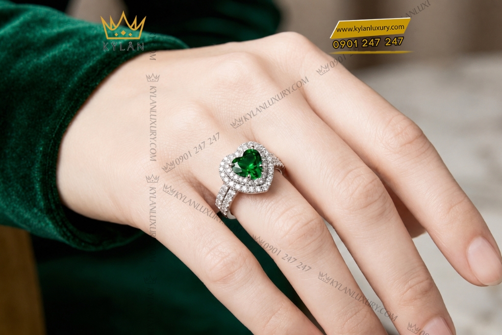 Nhẫn nữ vàng trắng Au750 đính sapphire xanh lá