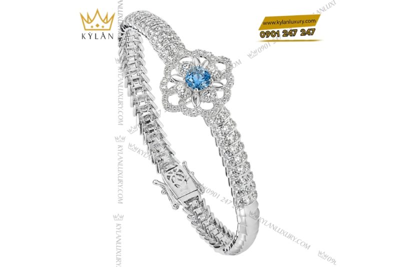 Vòng tay vàng trắng Au750 đính đá Topaz