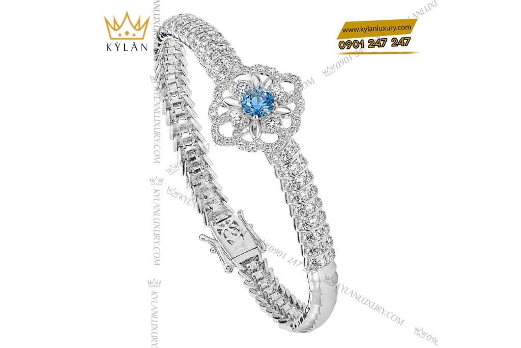 Vòng tay vàng trắng Au750 đính đá Topaz