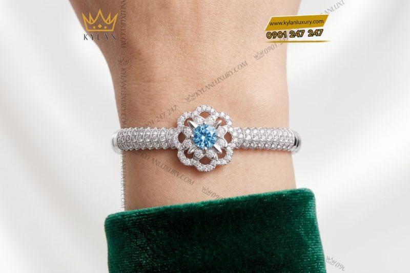 Vòng tay vàng trắng Au750 đính đá Topaz