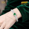 Vòng tay vàng trắng Au750 đính sapphire xanh lá