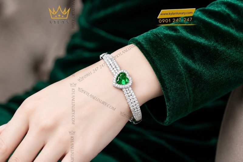 Vòng tay vàng trắng Au750 đính sapphire xanh lá