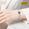 Vòng tay vàng trắng Au750 đính sapphire xanh lá