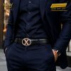 Mặt thắt lưng chữ X vàng hồng viền kim cương