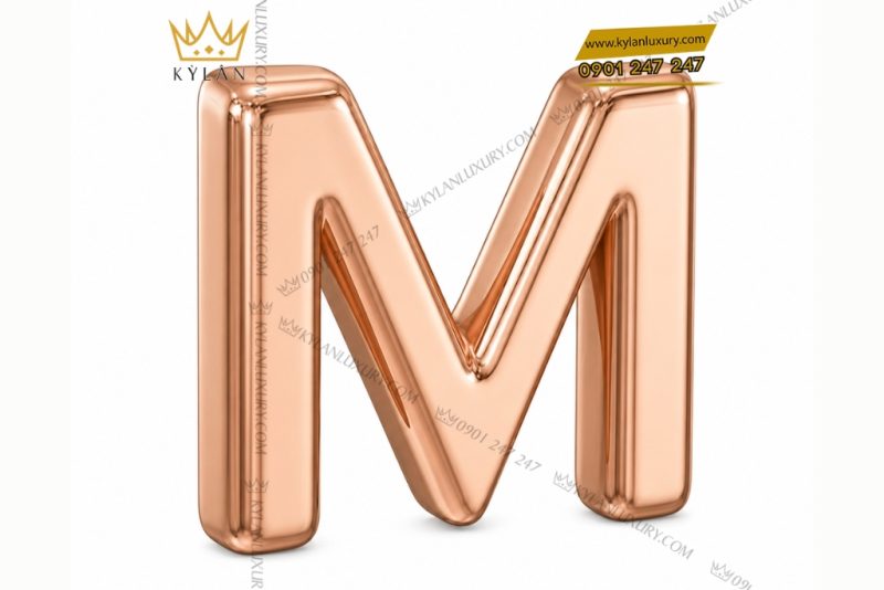 Mặt thắt lưng chữ M vàng hồng Au750